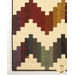 A closer look at the lower left corner of the quilt, demonstrating fabric prints and layout details.