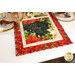 A close up on the runner, showing details on a block with poinsettias and the text "Love is the heart of the holidays."