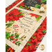 A close up on the runner, showing details on a block with poinsettias and the text "Cherish the moments that make the season."