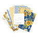 Swatches of fabrics from the navy colorway of the Morning Light one yard bundles featuring blue, white, and yellow floral and gingham fabrics