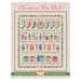 Digital spread of the finished Christmas Row Quilt pattern isolated on a floral background.