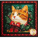 A close up one one of the cat panel blocks, showing details on the print and topstitching.