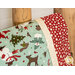 A close up on the pillowcase, demonstrating fabric prints and details.