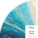 fanned collage of cream, aqua, teal and blue ocean-themed batiks.