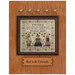The harvest friends pattern by Teresa Kogut staged in a dark wood picture frame.