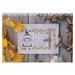 Front of the pattern displaying the finished project staged on a wooden board with fall foliage.