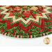 An angled super close up on the edge of the topper, showing fabric colors, prints, and top stitching details.