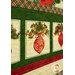 A close up angled shot of the quilt, showing details on the ornament blocks.