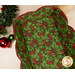 A top down shot of the inside of the basket, demonstrating details on the inside mistletoe print.