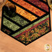 A close up on one end of the runner, demonstrating fabric details, colors, and patchwork.