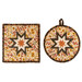 The completed Folded Hot Star Pads colored in autumn fabrics from the Bountiful collection by Riley Blake Designs, isolated on a white background. 