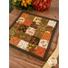 An angled shot of the hot pad, demonstrating details on the fabric prints and colors.