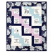 Patchwork quilt with floral border and square blocks featuring the grandchildren-themed blocks.