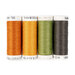 Four spools of orange, yellow, green, and gray thread isolated on a white background. 