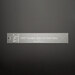 The 1-1/2-inch finished size fast fusible grid cutting tool ruler on a black background.