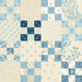 Cream fabric with a nine patch block cheater pattern.