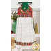 The completed Hanging Towel colored in cream, red, and green fabrics with gold metallic accents from the Adorn collection by Andover Fabrics, staged on a kitchen drawer with coordinating decor.