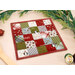 An angled shot of the hot pad, demonstrating details on the fabric prints and colors.