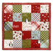 The completed Fusible Grid Hot Pad colored in wintry prints from the Chilly collection by Moda Fabrics, isolated on a white background. 