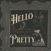 Closeup of the nine square panel showing a cat and skeletal mouse next to the words "Hello There My Pretty" inside of a gray ornate border.