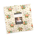 The Apricot Candy Layer Cake in its packaging, isolated on a white background. 