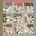 Patchwork Christmas quilt pattern with holiday words: Snowy, Believe, Peace, Joy, Star, Wish, Merry, Love, Noel.