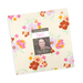 The Posy Layer Cake in its packaging, isolated on a white background. 