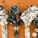 A closer look at the napkins, demonstrating fabric print and color details.