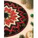 A closer look at one side of the topper, showing details on the Christmas prints; coordinating décor peeks into frame from the right side.