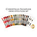 Christmas sampler cross-stitch floss set with assorted thread skeins arranged in a fan.