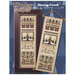 Front cover of the Winter Sampler cross stitch pattern with the finished pattern in an ornate wooden frame next to another finished example styled as a banner.