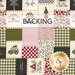 A swatch of fabric with a cream, green, red, and black patchwork square design featuring Christmas words and motifs; a transparent banner at the top reads "Backing." 