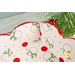 A stylized shot of one corner of the basket, showing details on the inner snowman print.