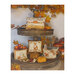 Photo of the four Autumn Pillow designs stacked on a tower of leaves, pumpkins, berries, and a squirrel hanging on a vase.