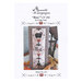 Front cover of the Boo! cross stitch pattern with a photo of the finished pattern leaning against a steel lantern next to yellow squash and maple leaves.