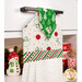 An angled close up on the top of the towel, demonstrating fabric colors on the prints and fabric button.
