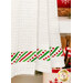 A super close up on the bottom of the towel, showing details on the towel texture and the fabric stripe.