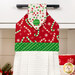 A close up on the top of the towel, demonstrating fabric colors on the prints and fabric button.