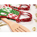 A close up on the apron straps of the hot pads, showing fabric details and the cute, small d-rings.