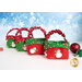 The four completed Tiny Treat Baskets in a row, staged on a white surface with a snowy blue background with coordinating candy and décor, demonstrating fabric colors and prints.