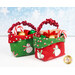 A shot of two of the Tiny Treat Baskets filled with treats and a gift card.