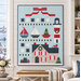 A mockup of the quilt, staged on a white shiplap wall in a Nantucket style home.