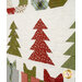 A close up on the patchwork of the quilt, showing details on a row of trees.