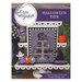 A Halloween cross stitch design with a tiered tray filled with a green monster, tombstones, potion bottles, a ghost, cauldron, pumpkins, and bats.