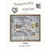 Front of the Sleigh Ride cross stitch pattern showing the finished project hung in a gold frame.