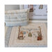 Photo of the finished designs with the pillow laying on the finished flat stitch design alongside a picture frame.