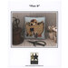 The front of the cross stitch pattern with an image of the finished cross stitch pillow staged with sewing notions.