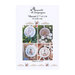 Front cover of the cross stitch pattern with the four finished patterns in their respective scenes of florals, grass, starfish, and wood.