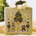 Cross-stitch pattern for Little House Needleworks, “Hometown Holiday – Caroling Quartet.”