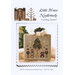Cross-stitch chart cover for Little House Needleworks, “Hometown Holiday – Caroling Quartet.”